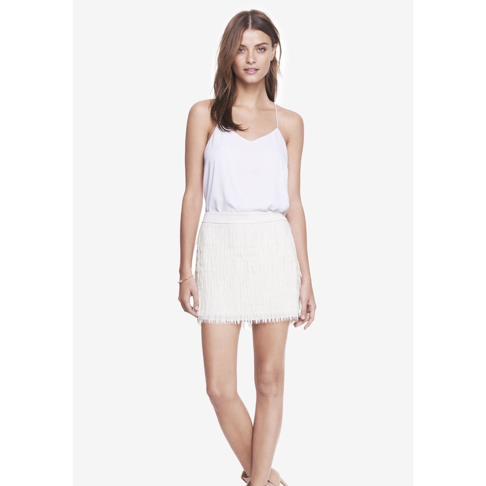 Express ivory fringe mini skirt.
